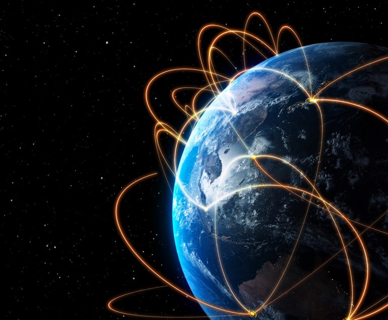 photo of the earth with lines representing communications