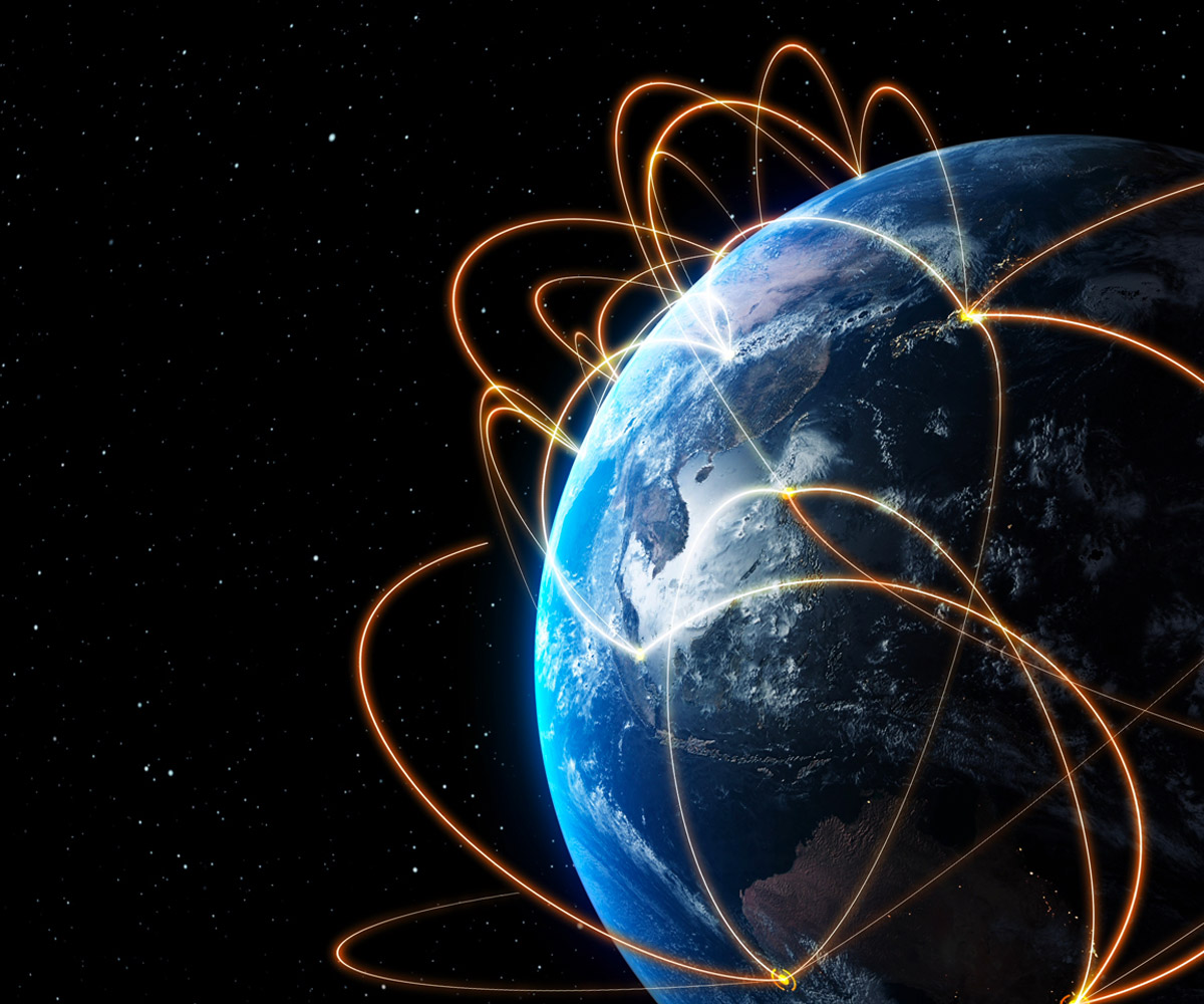photo of the earth with lines representing communications